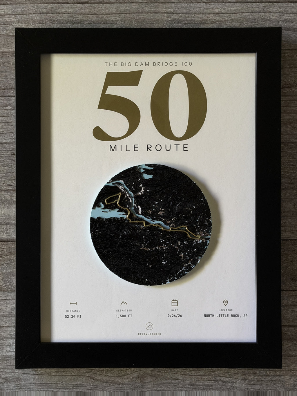 THE MARKER, 50 mile route of the Big Dam Bridge 100 — framed dimensional relief map in a black wood frame, shown front on